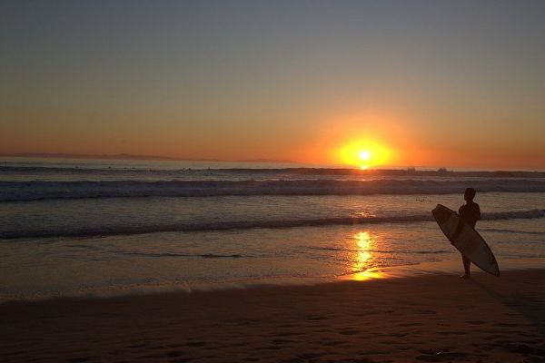 Surfer im Sonnenuntergang - Huntington Beach
