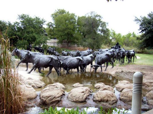 Dallas/TX_ Longhorn-Rinderherde in Bronze
