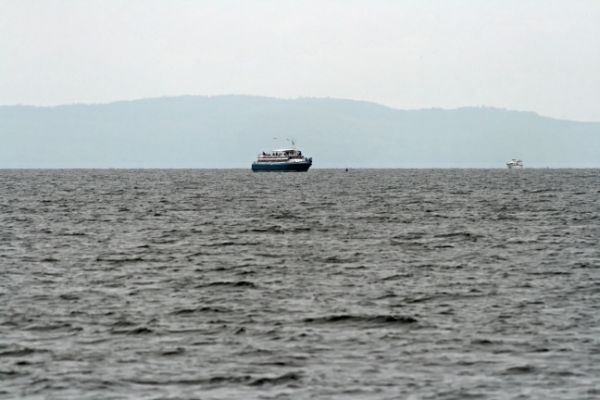 Orcaflosse und Boot
