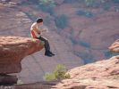 Justin playing Guitar over the Canyon